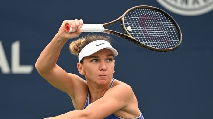Romanian tennis player Simona Halep returns a ball during the 2022 National Bank Open.